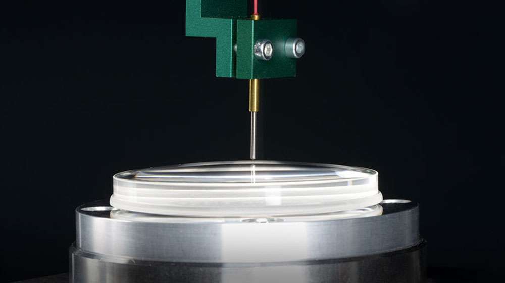 Roughness measurement on precision-manufactured optic