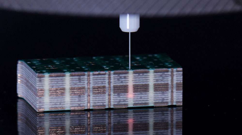Measuring in micro-drilled holes of a multilayer board